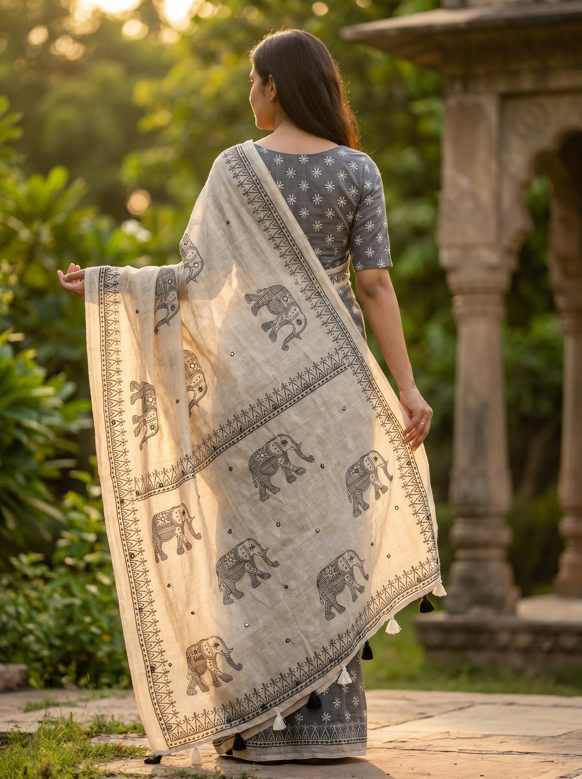 Amthi Off White Pure Linen Saree with Elephant Block Print, Mirror Work & Tribal Border