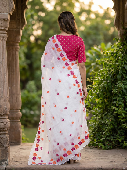 Amthi White Linen Saree with Lotus Floral , Gold Zari Aari Embroidery & Scallop Cut Border