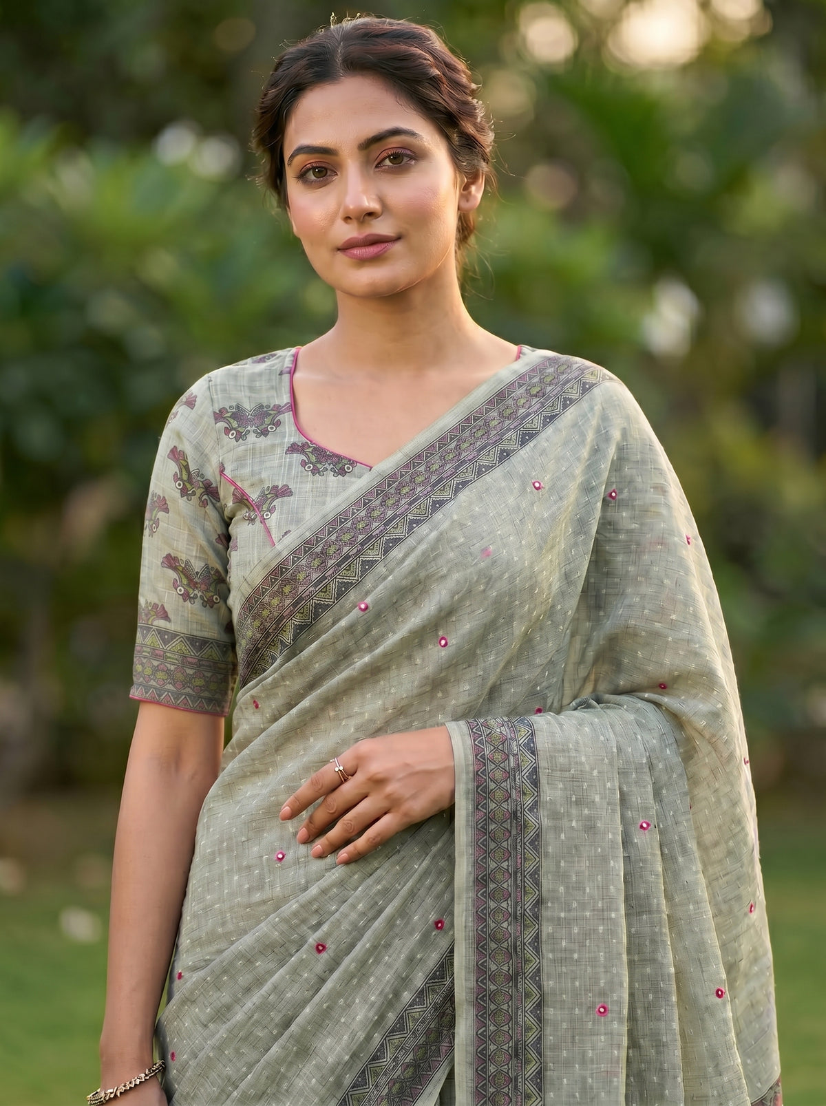 Amthi Sage Green Pure Linen Saree with Mirror Work Butti & Woven Geometric Border