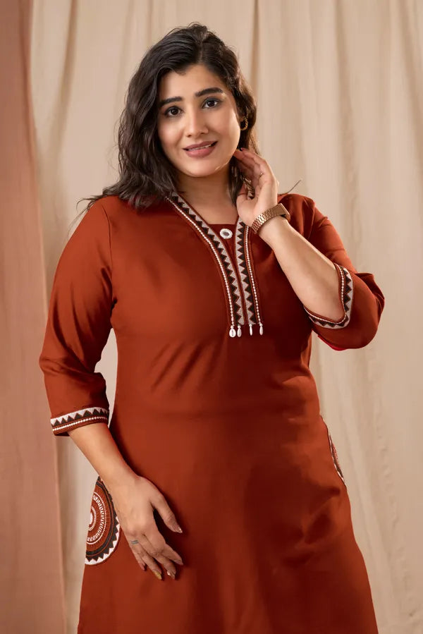 Amthi Women's Rust Rayon Embroidered Straight Kurta Pant Set